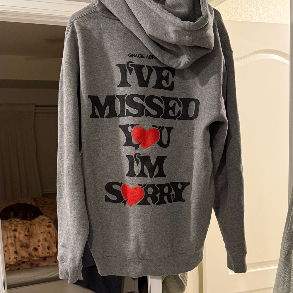 Gracie Abram’s Gray Hoodie with Heart Print